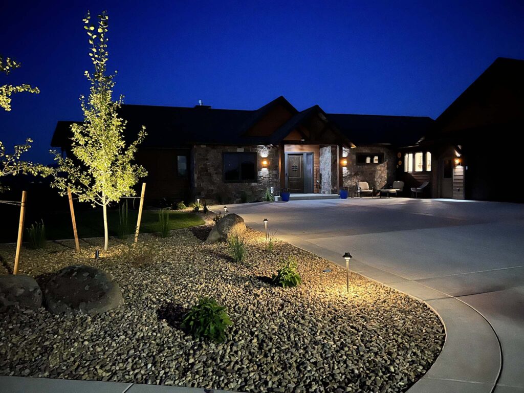 outdoor lighting illuminating residential landscaping