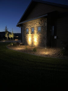 outdoor lighting illuminating residential landscaping