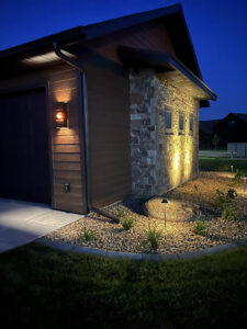 outdoor lighting illuminating residential landscaping